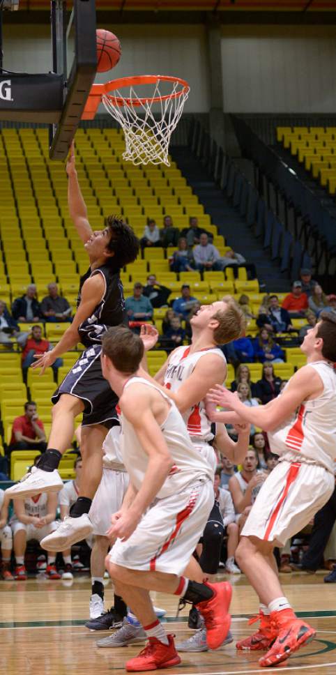 Leah Hogsten  |  The Salt Lake Tribune
Corner Canyon's John Mitchell with the bucket. 
Corner Canyon High School defeated Bountiful High School 62-42 during their 4A State boys' basketball playoff game at the UCCU Center on Utah Valley University's campus, Tuesday, February 28, 2017.