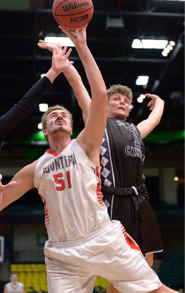 Leah Hogsten  |  The Salt Lake Tribune
Bountiful's Ryan Pollard and Corner Canyon's Zachary Wilson fight for a loose ball. Corner Canyon High School defeated Bountiful High School 62-42 during their 4A State boys' basketball playoff game at the UCCU Center on Utah Valley University's campus, Tuesday, February 28, 2017.