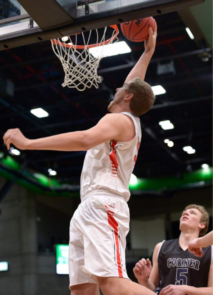Leah Hogsten  |  The Salt Lake Tribune
Bountiful's Ryan Pollard stuffs the net. Corner Canyon High School defeated Bountiful High School 62-42 during their 4A State boys' basketball playoff game at the UCCU Center on Utah Valley University's campus, Tuesday, February 28, 2017.