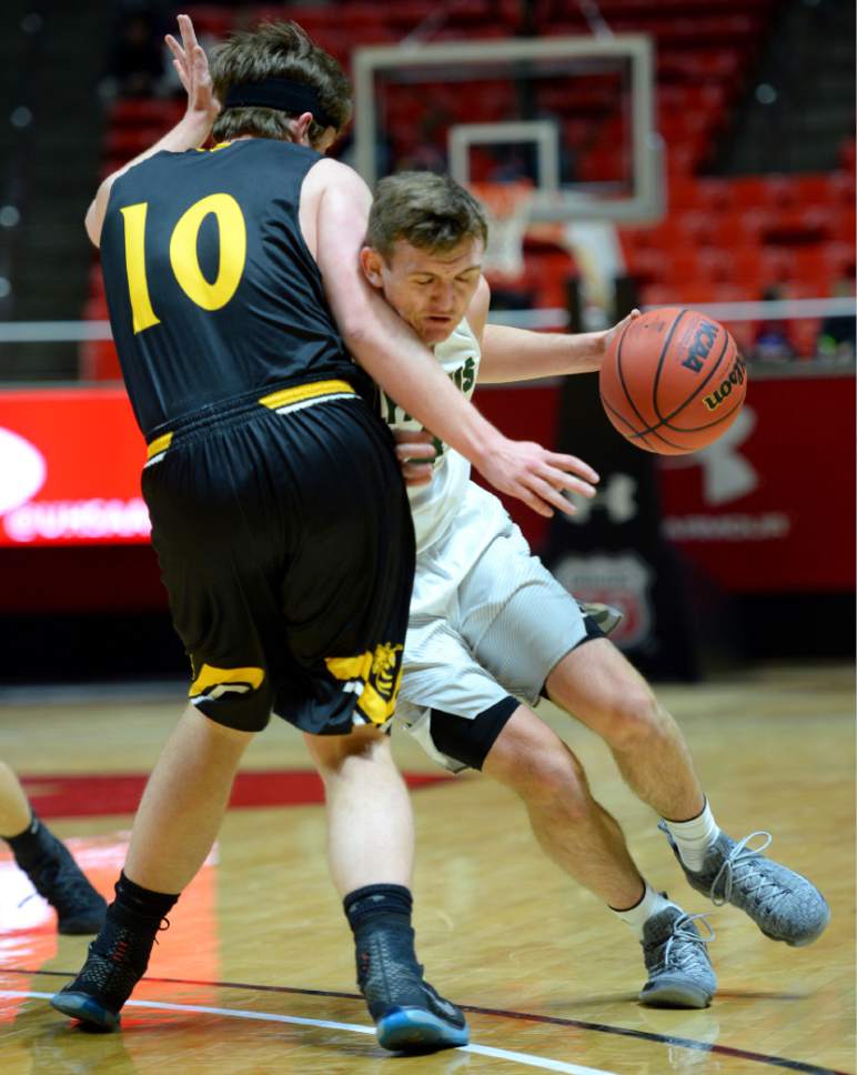 Steve Griffin  |  The Salt Lake Tribune


Olympus forward Matt Lindsey tries to get by Wasatch forward Matthew Nielson 4A playoff game against Wasatch at the Huntsman Center in Salt Lake City Tuesday February 28, 2017.