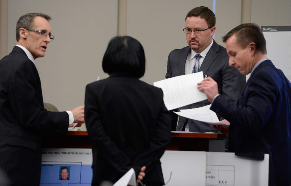 Scott Sommerdorf | The Salt Lake Tribune
Attorneys for both the prosecution and the defense review jury instructions as former Utah Attorney General John Swallow in court for his public corruption trial, Wednesday, March 1, 2017.