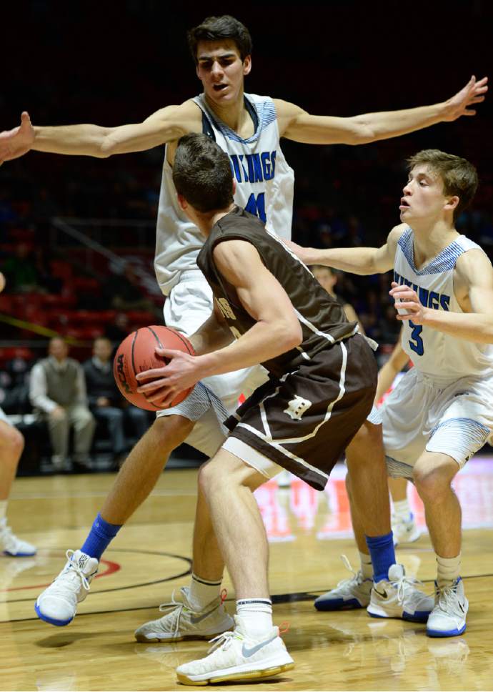 Francisco Kjolseth | The Salt Lake Tribune
Pleasant Grove's Matthew Van Komen towers over Davis at 7 foot 3 in the 5A boys' basketball playoff game at the Huntsman Center on the University of Utah campus on Monday, February 27, 2017.