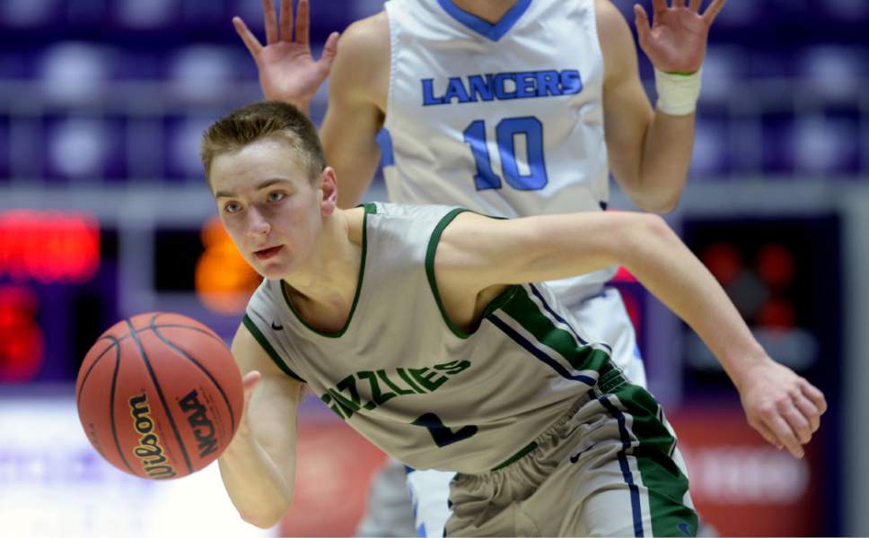 Steve Griffin  |  The Salt Lake Tribune


Copper Hills guard Callahan Blackham breaks the Layton press during 5A playoff game at the Dee Events Center in Ogden Wednesday March 1, 2017