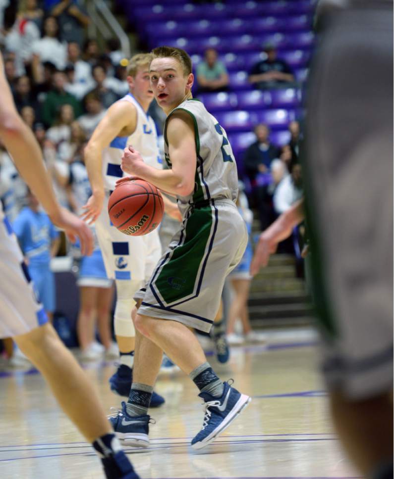 Steve Griffin  |  The Salt Lake Tribune


Copper Hills guard Callahan Blackham controls the ball during 5A playoff game against Layton at the Dee Events Center in Ogden Wednesday March 1, 2017