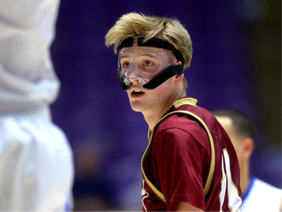 Steve Griffin  |  The Salt Lake Tribune


Viemont's Josh Mordue wears a protective mask during 5A playoff game against Bingham at the Dee Events Center in Ogden Wednesday March 1, 2017