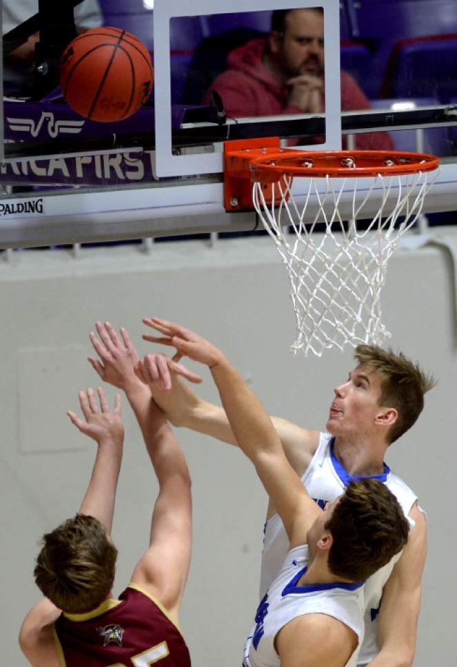 Steve Griffin  |  The Salt Lake Tribune


Bingham's Branden Carlson, right, blocks the shot of Viewmont's Chandler Cox during 5A playoff game at the Dee Events Center in Ogden Wednesday March 1, 2017.