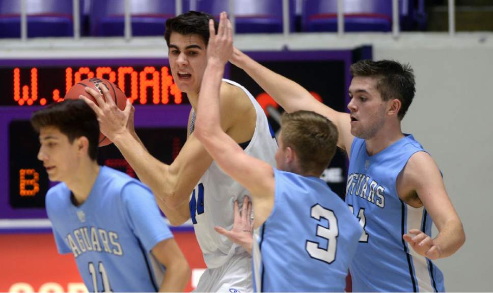 Steve Griffin  |  The Salt Lake Tribune


West Jordan packs the defense in around Pleasant Grove's 7-foot-3-inch center Matthew Van Komen during 5A playoff game between  and West Jordan at the Dee Events Center in Ogden Wednesday March 1, 2017.