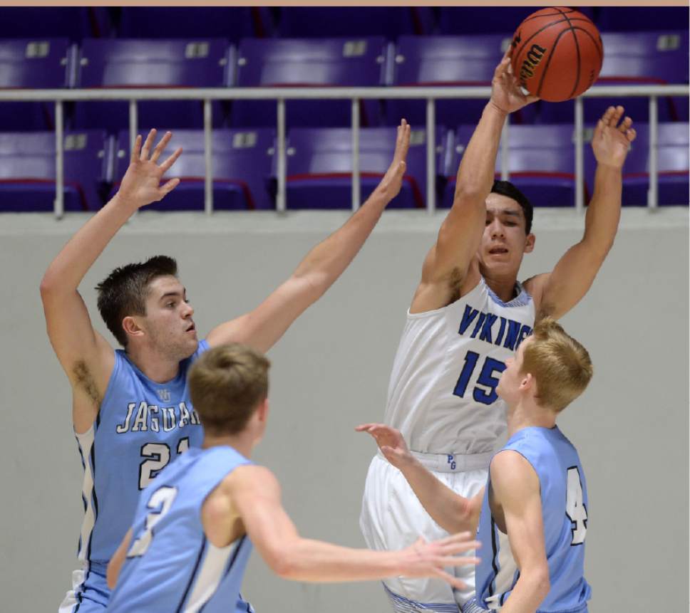Steve Griffin  |  The Salt Lake Tribune


Pleasant Grove's Kainoa Maldonado passes over the top of he West Jordan defense during 5A playoff game between  and West Jordan at the Dee Events Center in Ogden Wednesday March 1, 2017.