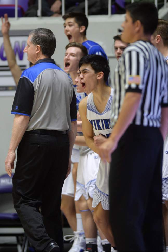 Steve Griffin  |  The Salt Lake Tribune


The Pleasant Grove bench gets fired up after Keanu Akina nailed a three-pointer extending their lead during 5A playoff game against  West Jordan at the Dee Events Center in Ogden Wednesday March 1, 2017.