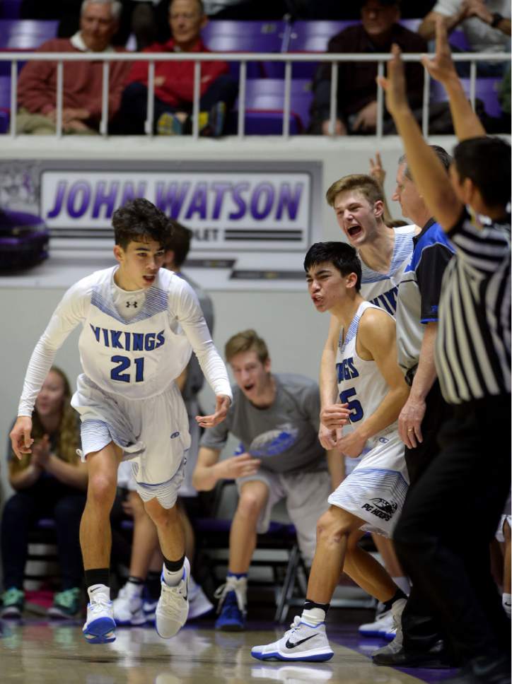 Steve Griffin  |  The Salt Lake Tribune


The Pleasant Grove bench gets fired up after Keanu Akina nailed a three-pointer extending their lead during 5A playoff game against  West Jordan at the Dee Events Center in Ogden Wednesday March 1, 2017.