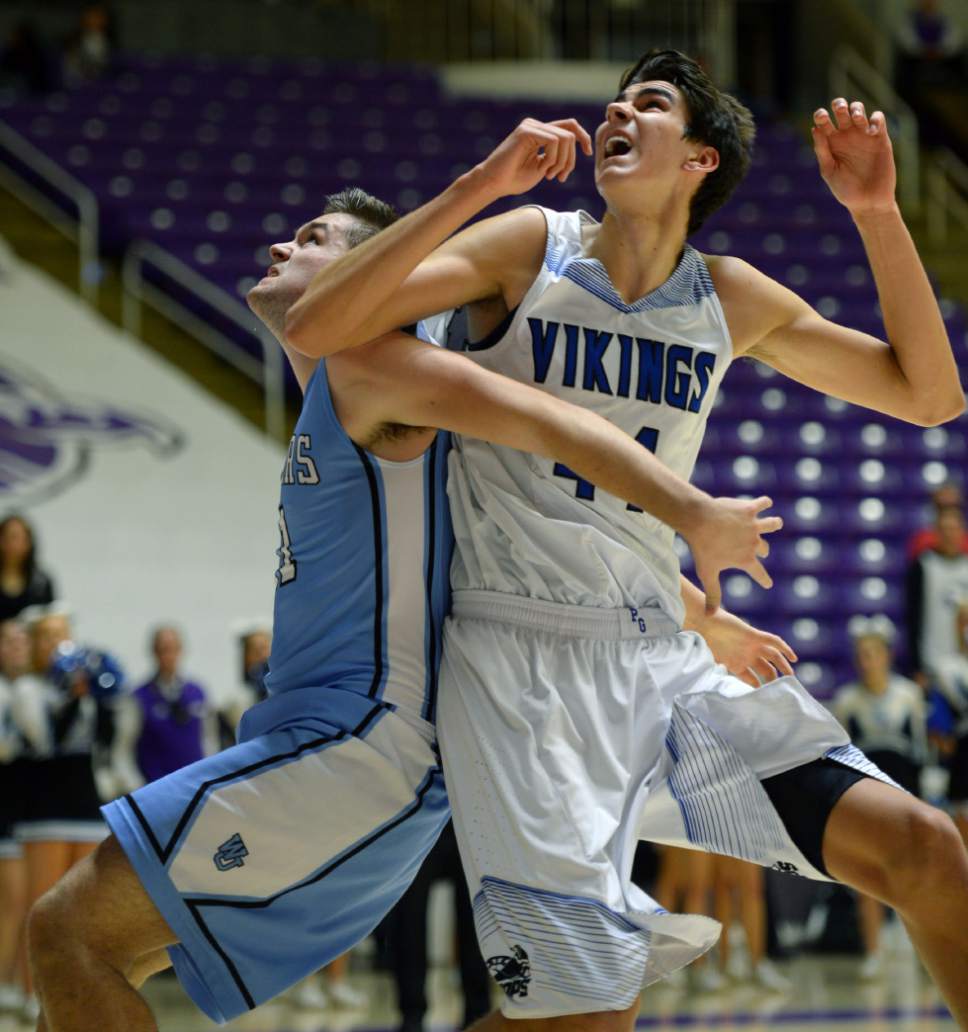 Steve Griffin  |  The Salt Lake Tribune


West Jordan's Bryan Banks tries to keep Pleasant Grove's 7-foot-3-inch center Matthew Van Komen away from the basket during 5A playoff game at the Dee Events Center in Ogden Wednesday March 1, 2017.