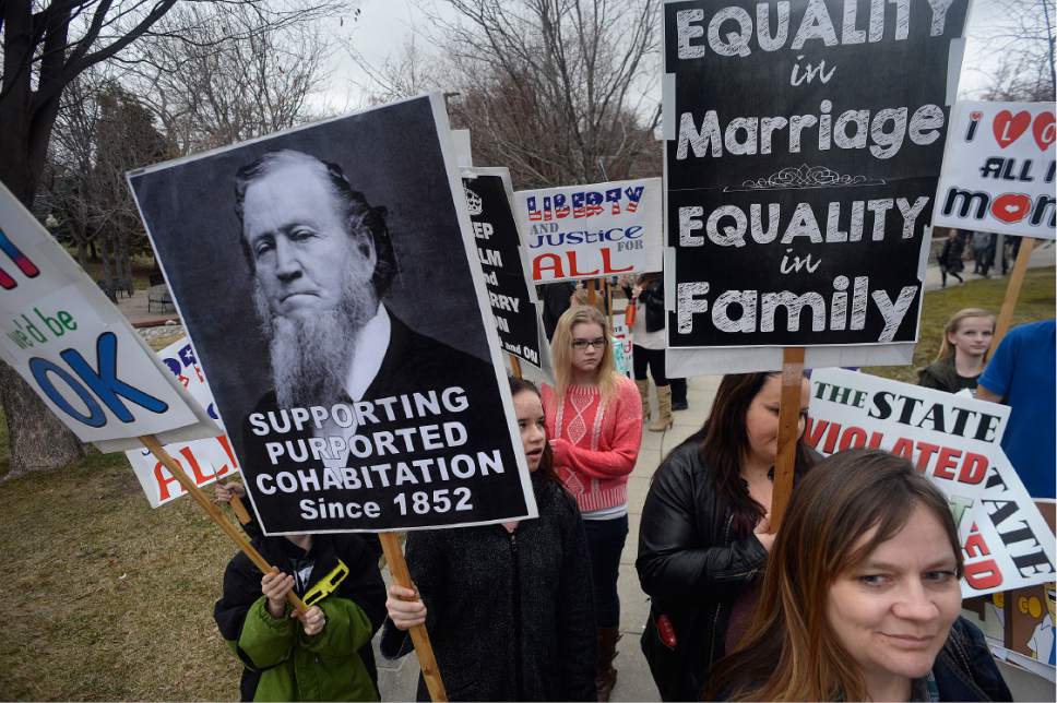 Scott Sommerdorf   |  The Salt Lake Tribune  
Polygamists and their supporters assembled at City Creek Park prior to their march to the Capitol where they held a rally, Friday, February 10, 2017.