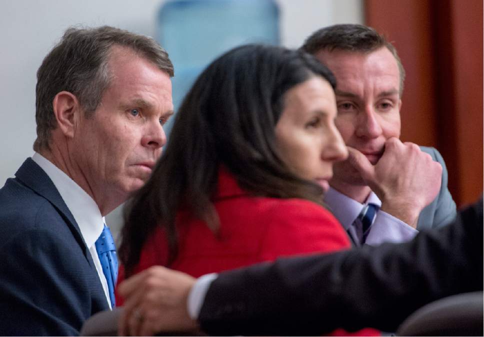 Rick Egan  |  The Salt Lake Tribune

John Swallow listens as members of his defense team, Cara Tangaro, Scott Williams and Brad Anderson discuss how to correct an error in the jury instructions,  in Judge Elizabeth Hruby-Mills courtroom in Salt Lake City, Thursday, March 2, 2017.