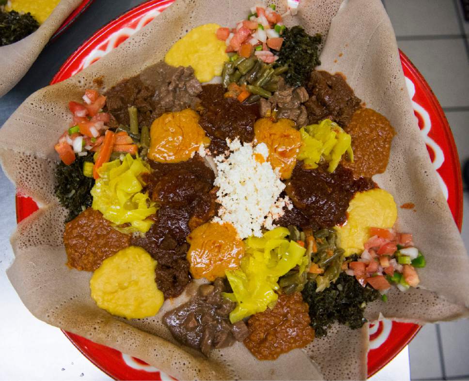Rick Egan  |  The Salt Lake Tribune

The "Taste of Mahider," an array of doro wot, beef and vegetarian dishes, arranged with injera, at the Mahider Ethiopian Restaurant in Salt Lake City.