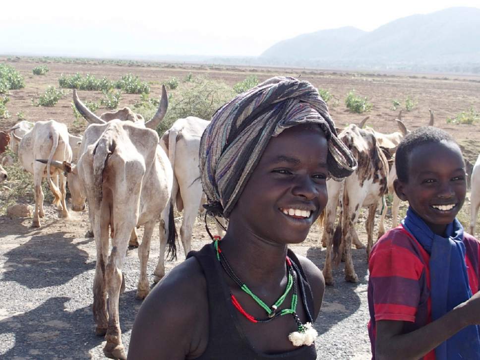 Christopher Smart  |  The Salt Lake Tribune

Young herders in Ethiopia's Lower Omo Valley drive their cattle to water every day during the dry season.