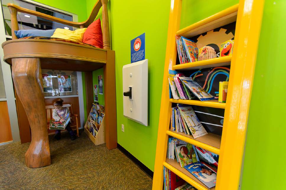 Trent Nelson  |  The Salt Lake Tribune
Marlee Shea reads a book at Discovery Gateway Children's Museum's new exhibit The Reading Nook, in Salt Lake City, Thursday March 2, 2017.