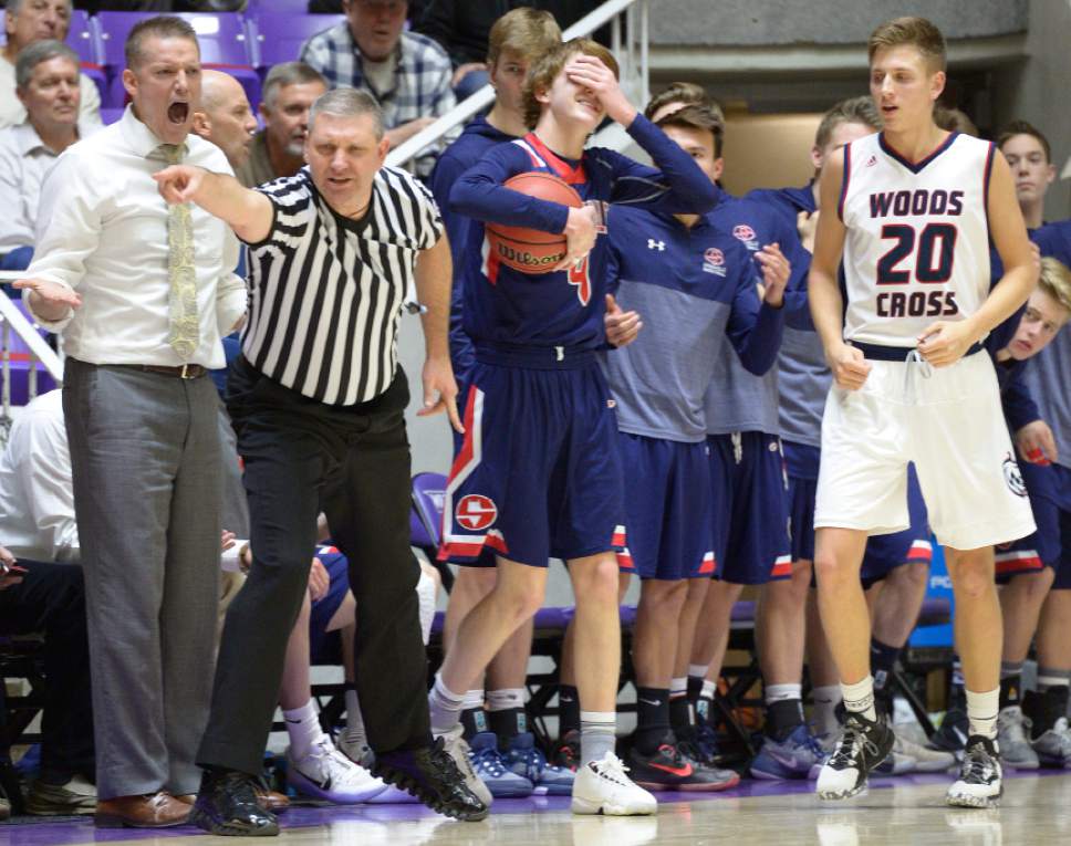 Leah Hogsten  |  The Salt Lake Tribune
Springville's head coach Justin Snell and player Jesse Hullinger react to a turnover in the fourth period. Springville High School defeated Woods Cross High School 51-50 at the buzzer during their 4A State boys' basketball quarterfinal playoff game at Weber State University's Dee Events Center, Thursday, March 2, 2017.