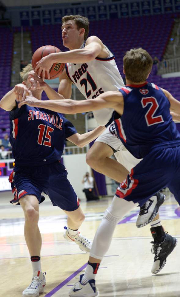 Leah Hogsten  |  The Salt Lake Tribune
Springville's Mason Sumsion and Seth Mortensen pressure Woods Cross' Trevin Knell. Springville High School defeated Woods Cross High School 51-50 at the buzzer during their 4A State boys' basketball quarterfinal playoff game at Weber State University's Dee Events Center, Thursday, March 2, 2017.