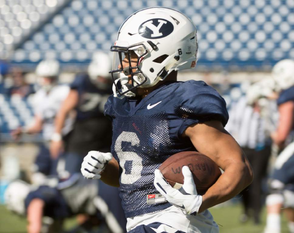 Rick Egan  |  The Salt Lake Tribune

Brigham Young running back Trey Dye runs with the ball  in the final practice of spring camp, at LaVell Edwards Stadium, Friday, April 1, 2016.