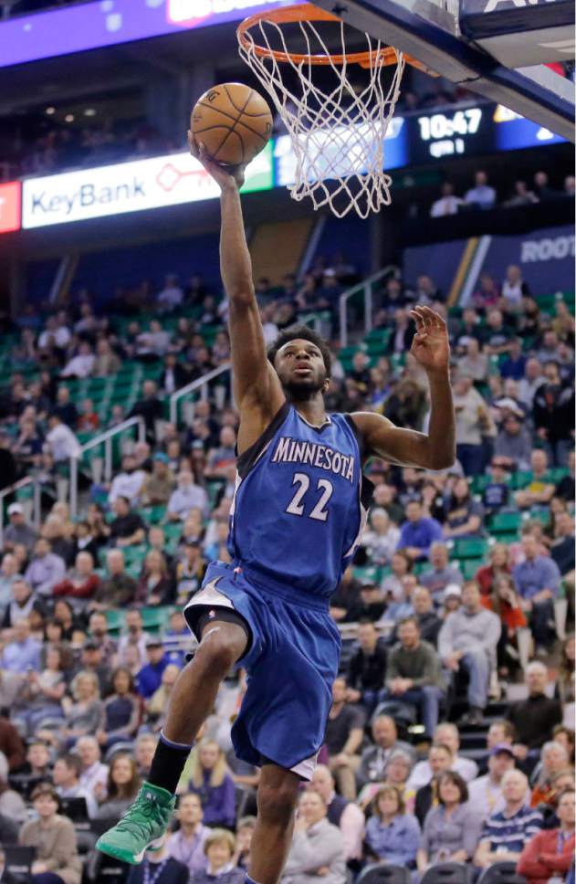 Minnesota Timberwolves forward Andrew Wiggins (22) lays the ball up during the first half in an NBA basketball game against the Utah Jazz Wednesday, March 1, 2017, in Salt Lake City. (AP Photo/Rick Bowmer)