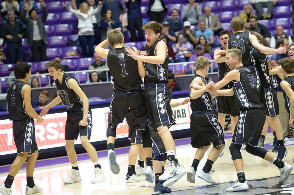 Leah Hogsten  |  The Salt Lake Tribune
Corner Canyon celebrates the win. Corner Canyon High School defeated Maple Mountain High School 69-67 during their 4A State boys' basketball quarterfinal playoff game at Weber State University's Dee Events Center, Thursday, March 2, 2017.