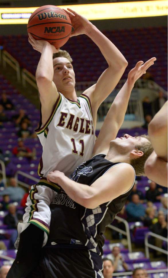 Leah Hogsten  |  The Salt Lake Tribune
Maple Mountain's Tyler Boyack topples over Corner Canyon's Ammon Jensen. Corner Canyon High School defeated Maple Mountain High School 69-67 during their 4A State boys' basketball quarterfinal playoff game at Weber State University's Dee Events Center, Thursday, March 2, 2017.
