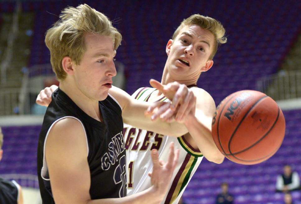 Leah Hogsten  |  The Salt Lake Tribune
Maple Mountain's Dawson Hall and Corner Canyon's Blake Emery fight for possession. Corner Canyon High School defeated Maple Mountain High School 69-67 during their 4A State boys' basketball quarterfinal playoff game at Weber State University's Dee Events Center, Thursday, March 2, 2017.
