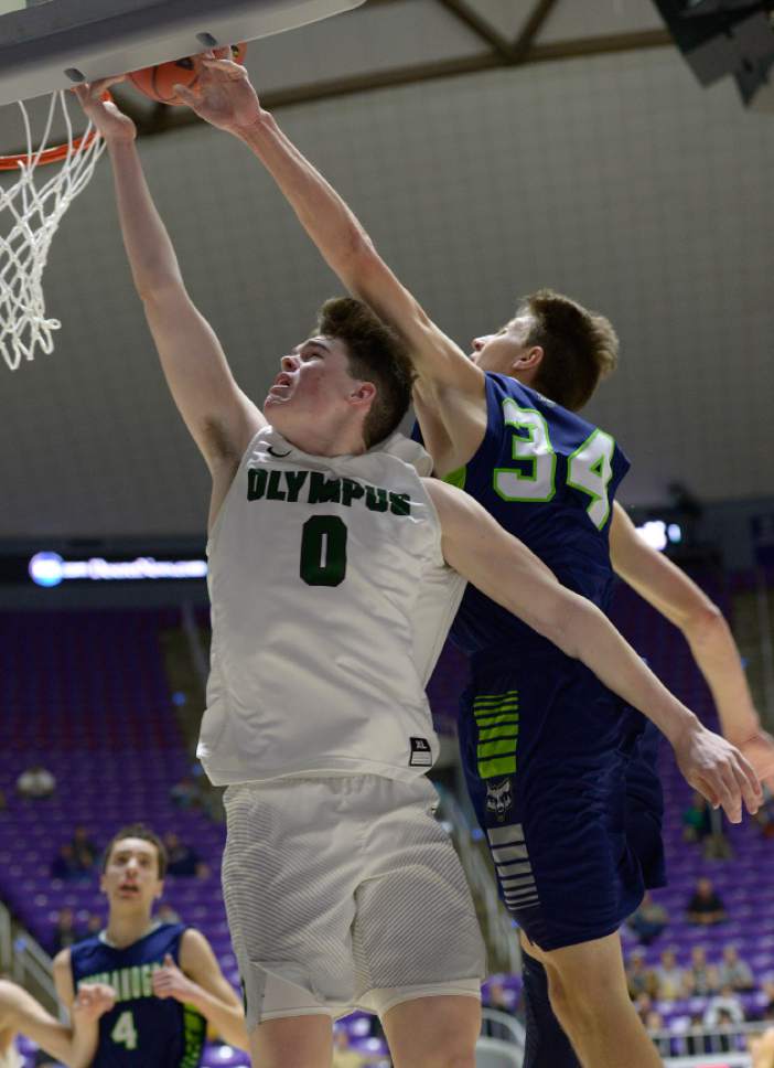 Leah Hogsten  |  The Salt Lake Tribune
Olympus' Jeremy Dowdell is fouled by Timpanogos' Derik Eaquinto. Olympus High School defeated Timpanogos High School 91-69 during their 4A State boys' basketball quarterfinal playoff game at Weber State University's Dee Events Center, Thursday, March 2, 2017.