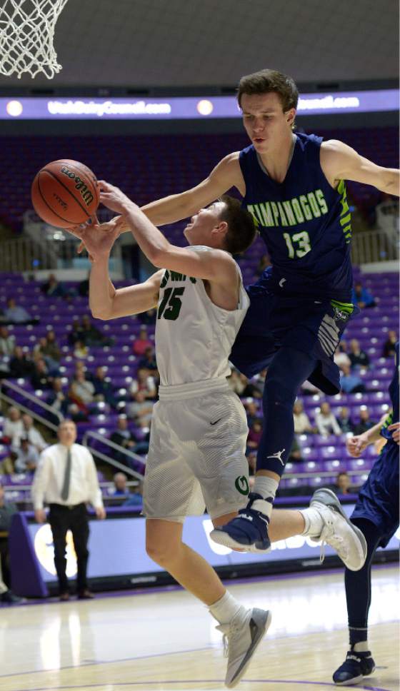 Leah Hogsten  |  The Salt Lake Tribune
Timpanogos' Conner Halford fouls Olympus' Rylan Jones. Olympus High School defeated Timpanogos High School 91-69 during their 4A State boys' basketball quarterfinal playoff game at Weber State University's Dee Events Center, Thursday, March 2, 2017.