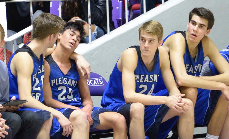 Leah Hogsten  |  The Salt Lake Tribune
Pleasant Grove's Kawika Akina is comforted by Jake Jensen after he fouled out of the game. Bingham High School defeated Pleasant Grove High School 54-44 during their 5A State boys' basketball semifinal playoff game at Weber State University's Dee Events Center, Friday, March 3, 2017.