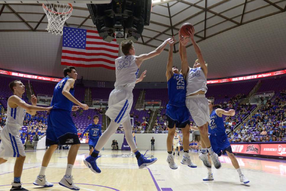 Leah Hogsten  |  The Salt Lake Tribune
Pleasant Grove's Kawika Akina and Bingham's Preston Fowlks fight for the rebound. Bingham High School defeated Pleasant Grove High School 54-44 during their 5A State boys' basketball semifinal playoff game at Weber State University's Dee Events Center, Friday, March 3, 2017.
