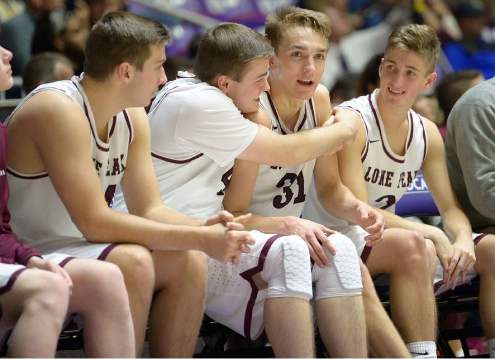 Leah Hogsten  |  The Salt Lake Tribune
Lone Peak's Maxwell McGrath, who had 21 points in the game, celebrates the win with teammates. Lone Peak High School defeated Copper Hills High School 88-73 during their 5A State boys' basketball semifinal playoff game at Weber State University's Dee Events Center, Friday, March 3, 2017.