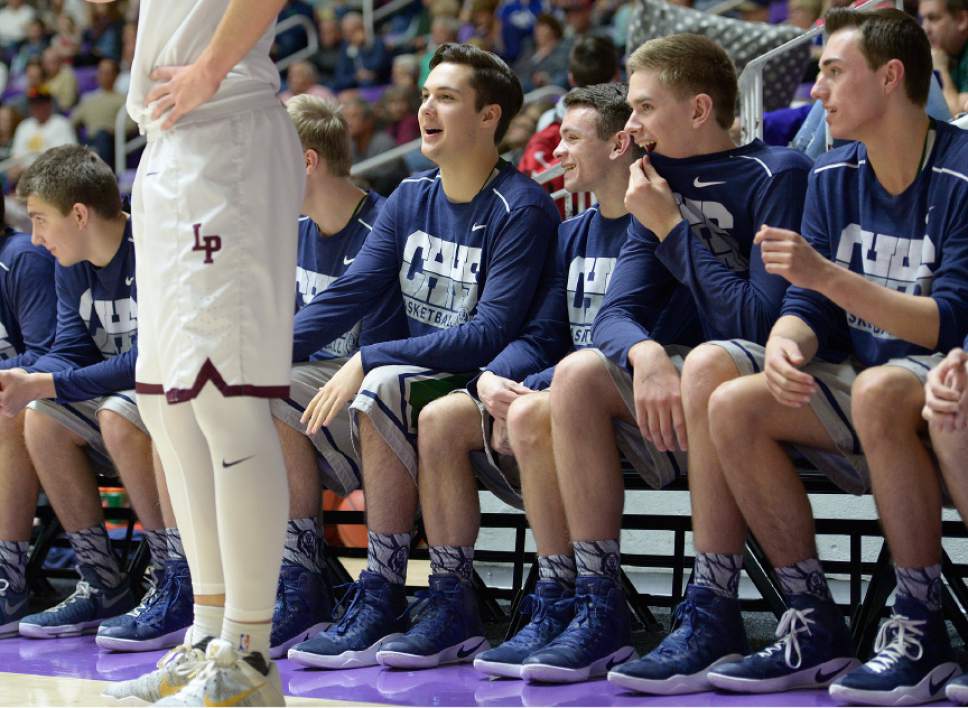 Leah Hogsten  |  The Salt Lake Tribune
Copper Hills' bench smack talk Lone Peak's Nate Harkness (35). Lone Peak High School leads Copper Hills High School 32-26 during their 5A State boys' basketball semifinal playoff game at Weber State University's Dee Events Center, Friday, March 3, 2017.