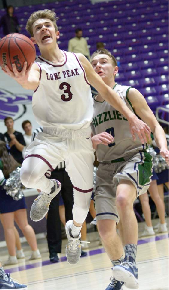 Leah Hogsten  |  The Salt Lake Tribune
Lone Peak's Steven Ashworth (3) drives to the net. Lone Peak High School leads Copper Hills High School 32-26 during their 5A State boysí basketball semifinal playoff game at Weber State University's Dee Events Center, Friday, March 3, 2017.