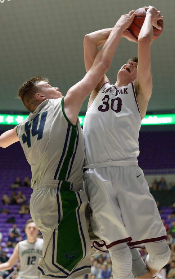 Leah Hogsten  |  The Salt Lake Tribune
Copper Hills Trevon Allfrey (44) fouls Lone Peak's Jackson Brinkerhoff (30). Lone Peak High School defeated Copper Hills High School 88-73 during their 5A State boys' basketball semifinal playoff game at Weber State University's Dee Events Center, Friday, March 3, 2017.