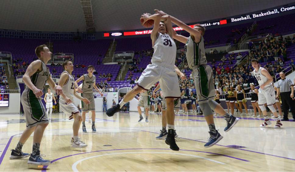 Leah Hogsten  |  The Salt Lake Tribune
Copper Hills Trevon Allfrey (44) fouls Lone Peak's Max McGrath (31) under the net. Lone Peak High School defeated Copper Hills High School 88-73 during their 5A State boys' basketball semifinal playoff game at Weber State University's Dee Events Center, Friday, March 3, 2017.