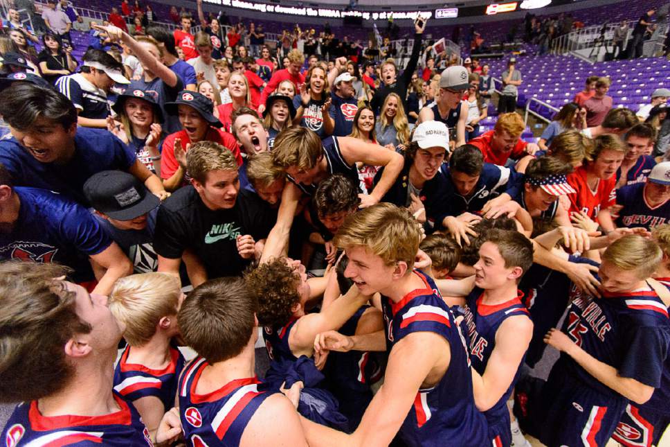 Trent Nelson  |  The Salt Lake Tribune
Springville players and fans celebrate their overtime win against Olympus in the 4A state high school basketball championship game, Saturday March 4, 2017.
