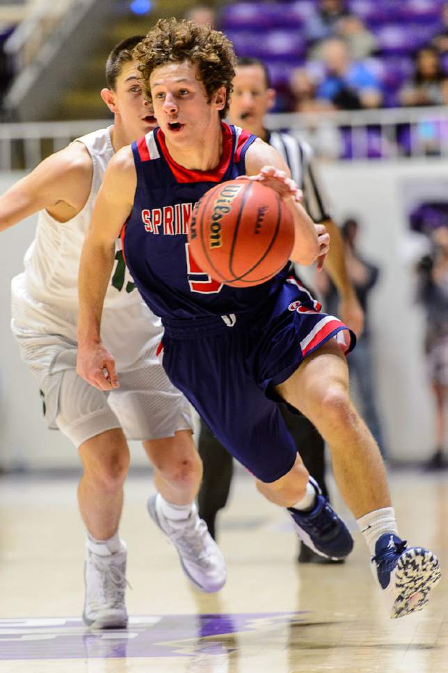 Trent Nelson  |  The Salt Lake Tribune
Springville's Bennett Hullinger (5) drives as Springville faces Olympus in the 4A state high school basketball championship game, Saturday March 4, 2017.
