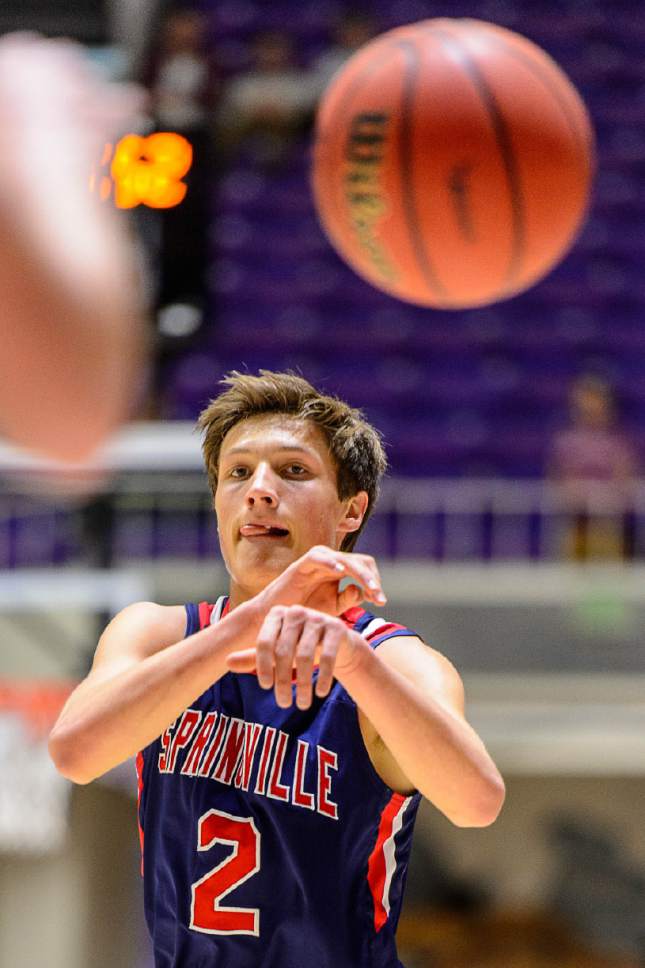 Trent Nelson  |  The Salt Lake Tribune
Springville's Seth Mortensen (2) passes the ball as Springville faces Olympus in the 4A state high school basketball championship game, Saturday March 4, 2017.
