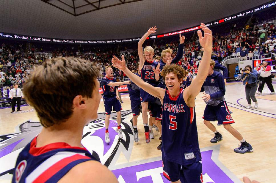 Trent Nelson  |  The Salt Lake Tribune
Springville players celebrate their overtime win against Olympus in the 4A state high school basketball championship game, Saturday March 4, 2017.
