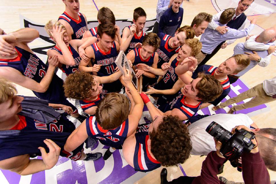 Trent Nelson  |  The Salt Lake Tribune
Springville players celebrate their overtime win against Olympus in the 4A state high school basketball championship game, Saturday March 4, 2017.