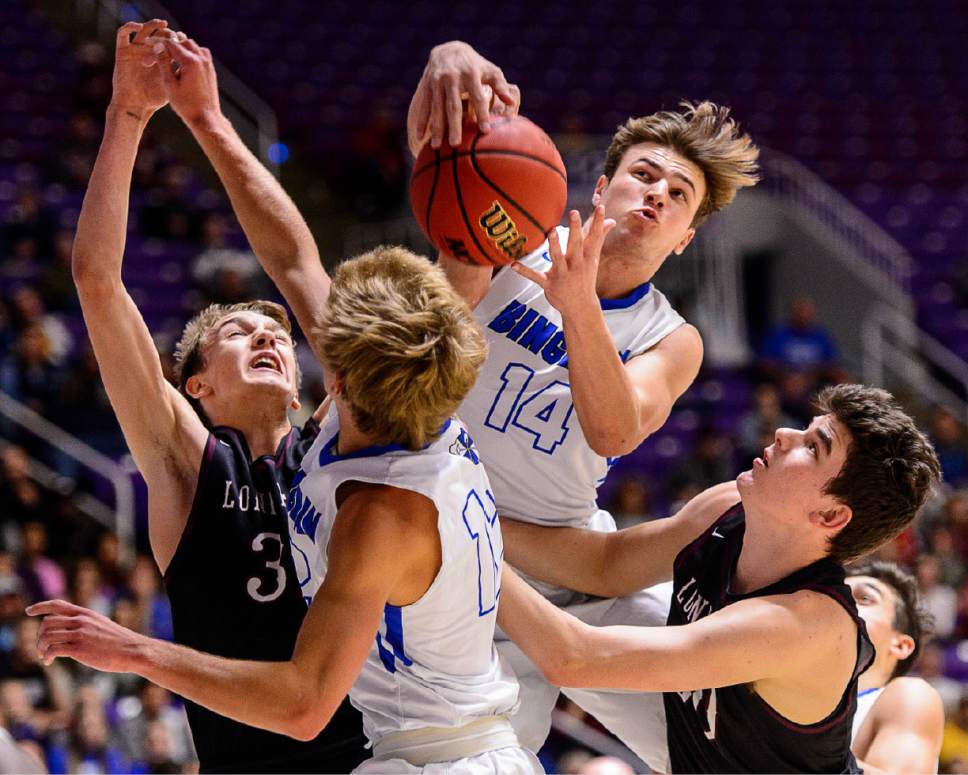 Trent Nelson  |  The Salt Lake Tribune
Bingham's Brayden Cosper (14) pulls down a rebound as Bingham faces Lone Peak in the 5A state high school basketball championship game, Saturday March 4, 2017.