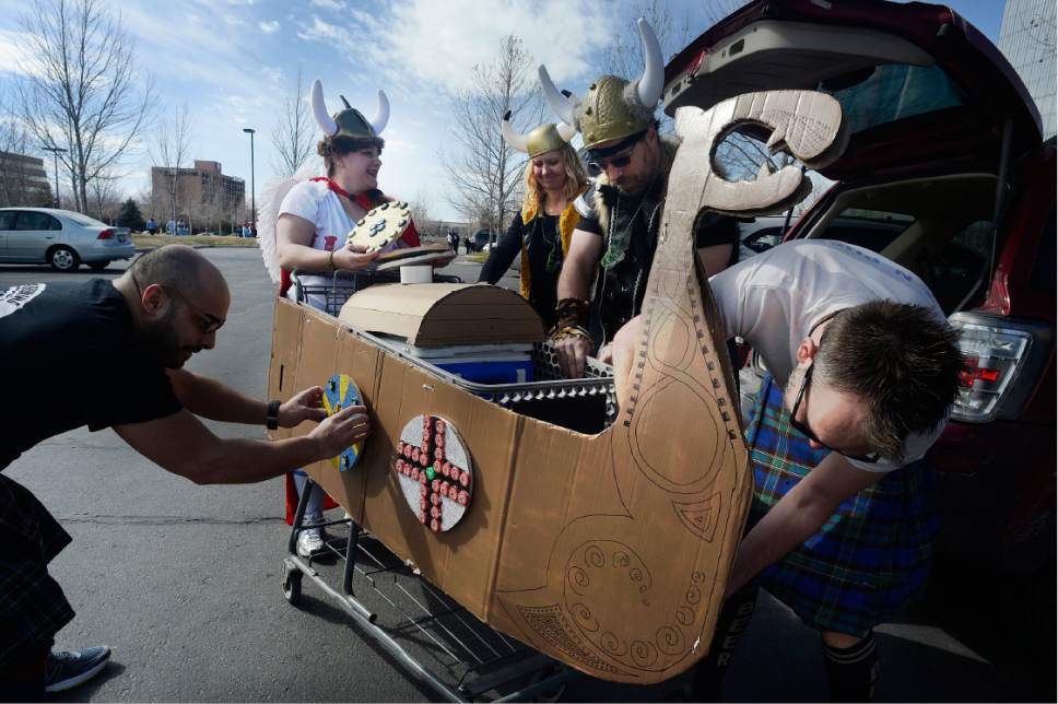 Scott Sommerdorf | The Salt Lake Tribune
Participants in the 10th Annual Urban Chariot Pub Crawl, formerly known as Urban Iditarod prepare their rolling Viking ship shopping cart, Saturday, March 4, 2017.