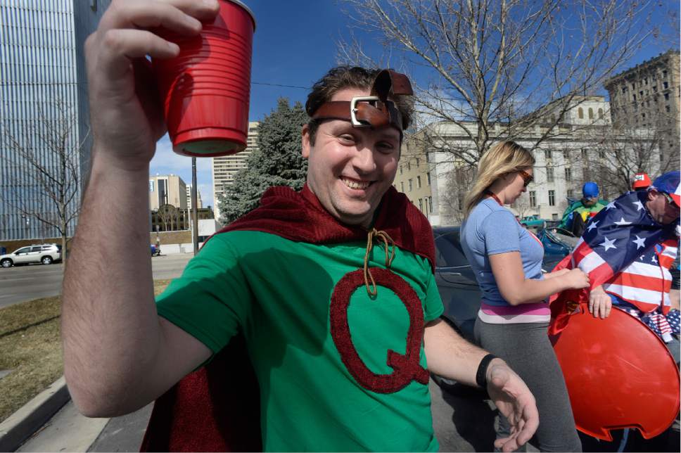 Scott Sommerdorf | The Salt Lake Tribune
Adam Morgan as "Quail Man" hoists his drink at the start of the of the 10th Annual Urban Chariot Pub Crawl, formerly known as Urban Iditarod, Saturday, March 4, 2017.