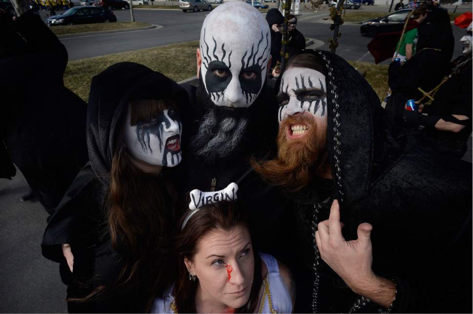 Scott Sommerdorf | The Salt Lake Tribune
"The Death Metal Best Friends Club" strike a pose as participants in the 10th Annual Urban Chariot Pub Crawl, formerly known as Urban Iditarod prepare, Saturday, March 4, 2017.