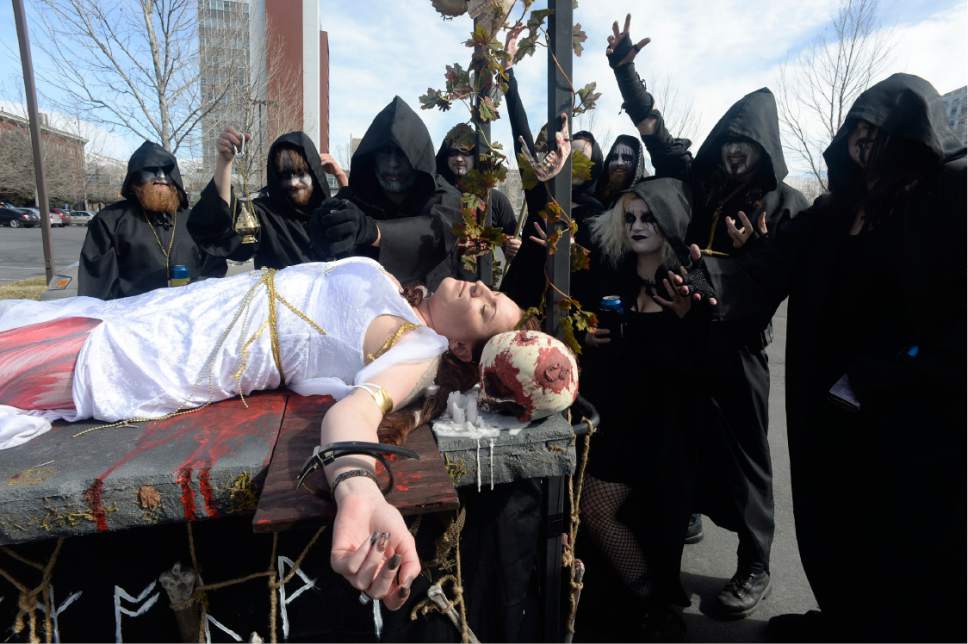 Scott Sommerdorf | The Salt Lake Tribune
"The Death Metal Best Friends Club" jokingly prepares their virgin for sacrificing prior to the 10th Annual Urban Chariot Pub Crawl, formerly known as Urban Iditarod, Saturday, March 4, 2017.