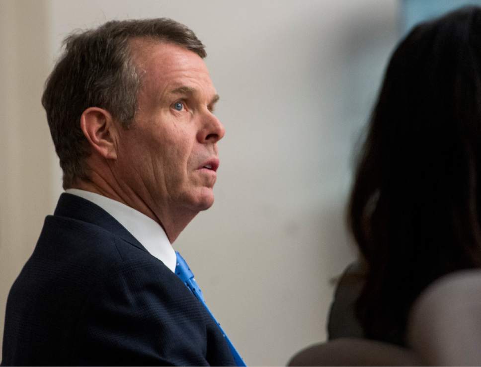 Rick Egan  |  The Salt Lake Tribune

John Swallow listens as members of his defense team, discuss how to correct an error in the jury instructions, in Judge Elizabeth Hruby-Mills courtroom in Salt Lake City, Thursday, March 2, 2017.