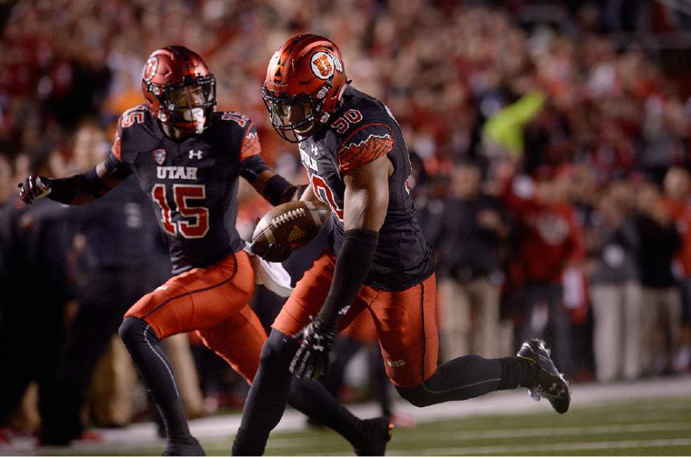 Scott Sommerdorf   |  The Salt Lake Tribune
The Utes thought they had a quick TD when Utah Utes DE Pita Taumoepenu (50) ran with what was thought to be a fumble by Arizona State Sun Devils QB Mike Bercovici (2). The play was reviewed, and overturned as an incompletion. Utah led Arizona State 14-10 at the half, Saturday, October 17, 2015.
