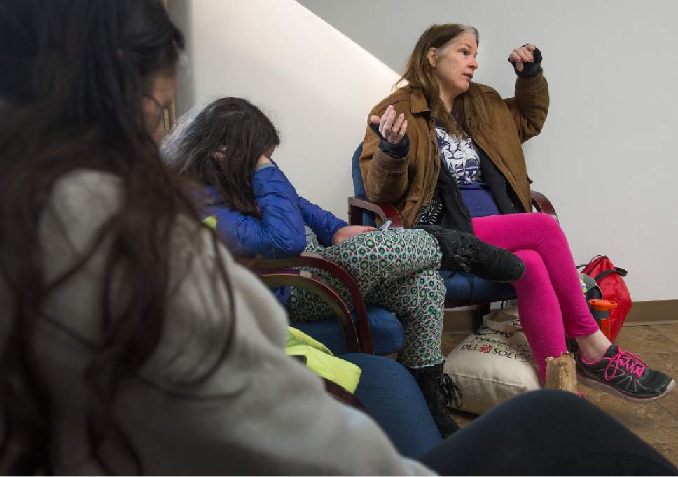 Leah Hogsten  |  The Salt Lake Tribune
Kimberly Gross and her two daughters, Petrina Westman, 14, (left) and Destiny Westman, 10, (center), are living back at The Road Home shelter after getting evicted from a Taylorsville home Gross could not afford through the shelter and its Rapid Rehousing program.