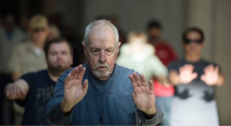 Lennie Mahler  |  The Salt Lake Tribune

Bernie Hart leads a group of homeless people in tai chi at the Salt Lake City Public Library, Thursday, March 2, 2017.